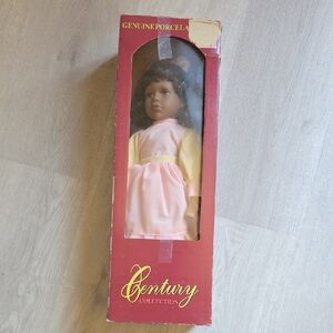 Porcelain Doll with Pink and Yellow Dress
